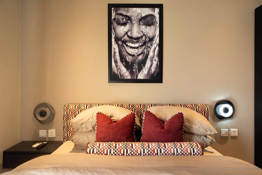 Bluewaters bedroom with warm lighting and art