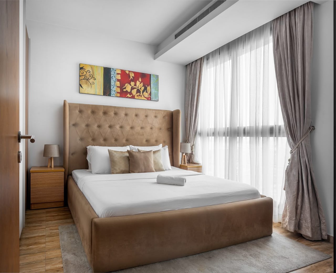 Eko Pearl Tower 11th-floor apartment bright ensuite bedroom