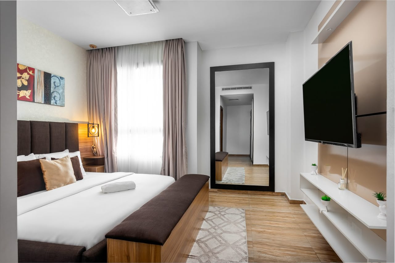 Eko Pearl Tower 11th-floor apartment bedroom with Smart TV