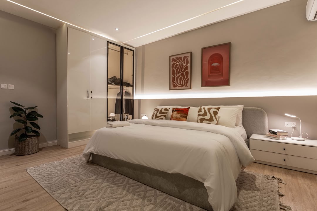 Stylish Lekki apartment ensuite bedroom with warm lighting