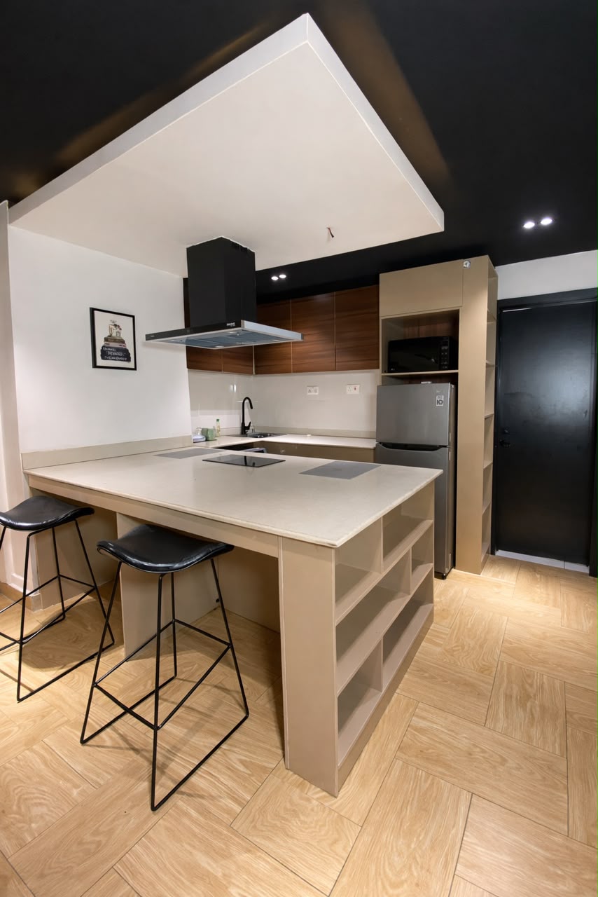 Yaba one-bedroom apartment kitchen with island and refrigerator